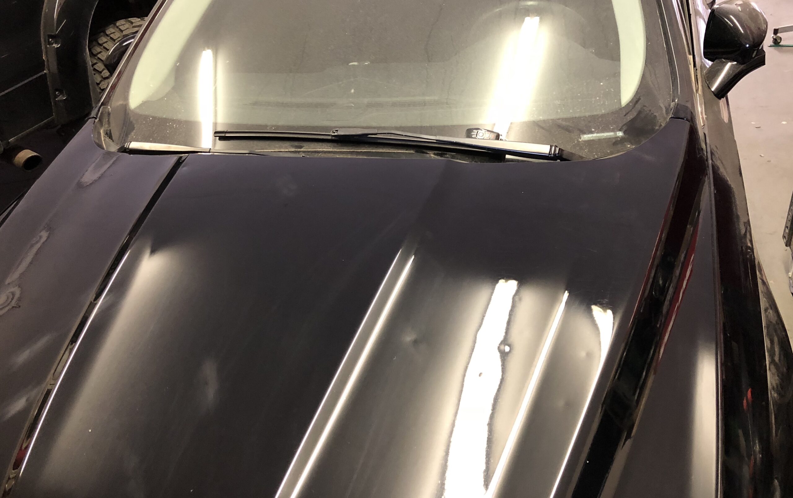 Auto Hail Damage On Ford Hood Panel