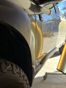 Crease Dent On Subaru Outback After Lord of the Dings Paintless Dent Repair Process Has Been Applied 